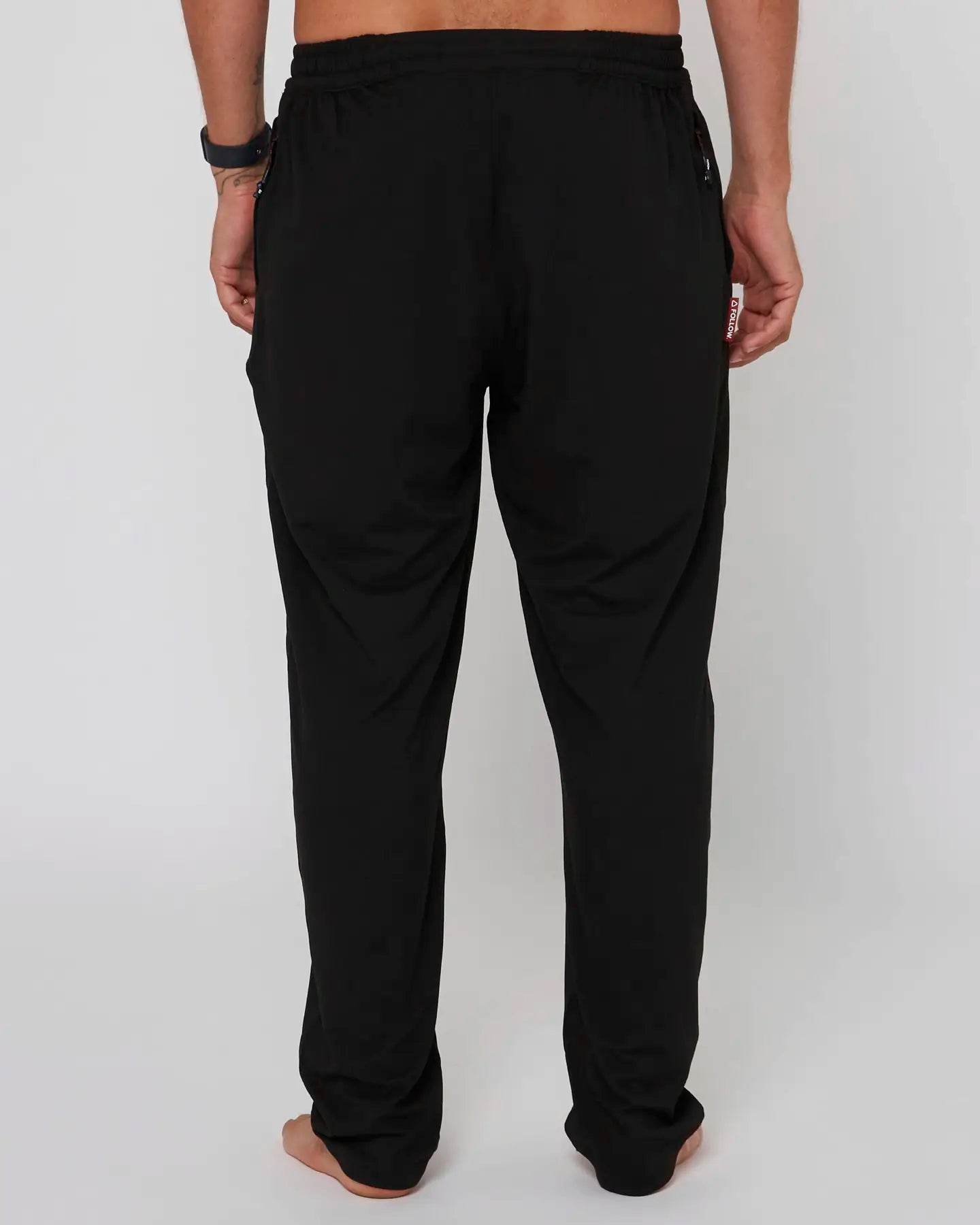 Follow Couch Trackies - Black Back